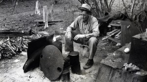 Harlingen (vicinity), Tex. Migrant worker sitting in front of fire. He lived with two other men workers By Russell Lee, 1903-1986, photographer 19390101. (Universal History Archive/UIG via Getty Images)