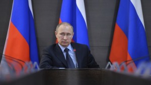 Russian President Vladimir Putin chairs a meeting on recent wildfires issues in Abakan