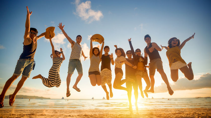Group of young people jumping
