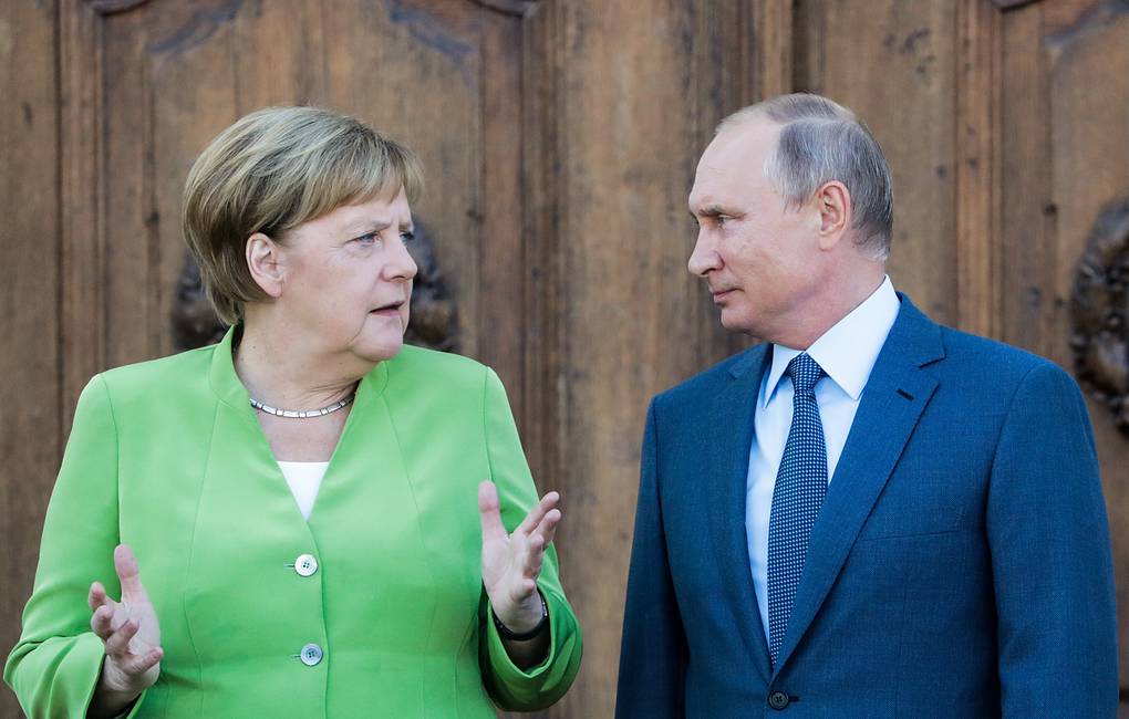 Russian President Putin meets with German Chancellor Merkel